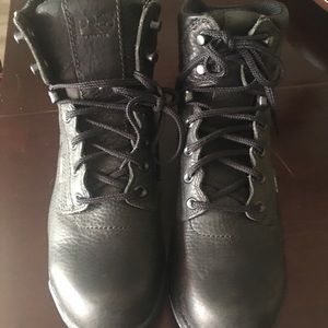 Black women’s Timberland, steel toed hiking boots